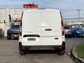 A white 2019 Ford Transit Connect van viewed from the rear with dual doors and the brand logo displayed on the back