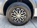 A close-up view of a 2019 Mercedes-Benz Sprinter front wheel featuring an alloy rim and a Continental VanContact Winter tire