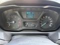 Dashboard of a 2017 Ford Transit showing speedometer fuel gauge and a digital display indicating distance and odometer reading