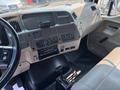Interior view of a 2006 Sterling Acterra dashboard featuring gauges a stereo system and gear shift with a steering wheel on the left