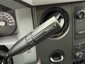 Close-up of the gear shift lever in a 2016 Ford F-550 Super Duty with a TOW/HAUL mode button