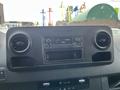 Dashboard of a 2025 Mercedes-Benz Sprinter featuring audio controls and air vents