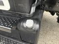 Close-up of the fuel tank cap on a 2006 Freightliner M2 106 truck with a rugged textured surface and shiny metal finish