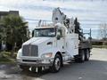 A white 2008 Kenworth T370 truck with a flatbed and a mounted equipment lift on top of the cab