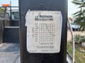 A label on a 2006 Sterling Acterra truck showing a load chart with measurements for load pounds and load radius in feet