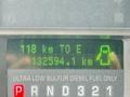 A digital dashboard display showing a 2008 Ford F-450 SD with a distance to empty reading of 118 km and a total distance traveled of 132594.1 km