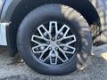 A close-up of a wheel from a 2021 Mercedes-Benz Sprinter 2500 showcasing a metallic silver multi-spoke design with a black tire