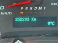 A digital dashboard display showing a 2019 Chevrolet Express with a speedometer reading in kilometers per hour and an odometer reading of 352293 kilometers and a temperature of 9 degrees Celsius