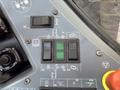 Control panel of a 2018 Sandvik Ranger DX800 featuring various buttons and switches with labels for operational functions