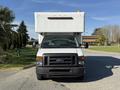 White 2012 Ford Econoline E-450 with a large box body and a front grille displaying the Ford logo