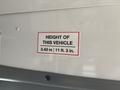 Sign indicating the height of a 2020 Chevrolet Express vehicle as 3.43 m or 11 ft 3 in