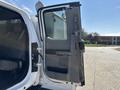 A 2017 Ford F-550 with the driver's side door open revealing the interior and seat design