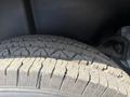 Close-up of a worn tire tread of a 1976 GMC Palm Beach showing distinct patterns and grooves