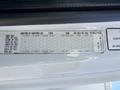 Label information for a 2005 Freightliner M2 106 including weight capacities tire specifications and rim details