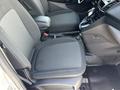Interior view of a 2021 Ford Transit Connect showing front seats and center console with gear shift and controls