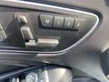 Control panel inside a 2014 Mercedes-Benz CLA-Class featuring seat adjustment buttons with memory settings labeled 1 2 3 and a lever for manual adjustment