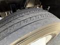 Close-up of a tire from a 2017 Freightliner MT45 showcasing its tread pattern and rubber surface