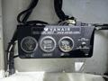 A Van Air control panel featuring gauges for receiver pressure and hour meter along with a discharge temperature gauge