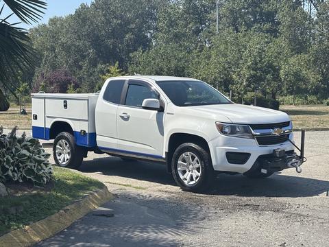 White 2017 Chevrolet Colorado with a blue and silver utility bed featuring storage compartments and a front-mounted winch