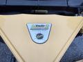 2023 Ford F-250 with a yellow plow attachment featuring a logo that reads Minute Mount 2 and Fisher Rockland Maine