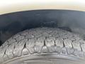 Close-up of a tire from a 2020 Chevrolet Express showing a textured tread pattern designed for traction