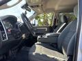 Interior of a 2014 RAM 5500 showing the driver's seat and dashboard with a steering wheel and center console