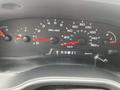 Dashboard of a 2006 Ford Econoline displaying speedometer tachometer and fuel gauges