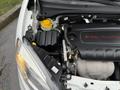 Engine compartment of a 2017 RAM ProMaster City showing the 24L multi-air engine with visible components like the air filter and coolant reservoir