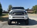 A white 2018 RAM 3500 truck facing forward with a prominent grille and large tires