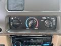 The image shows the climate control panel of a 2006 Sterling Acterra with dials for fan speed and temperature settings along with a display indicating a disconnected stereo