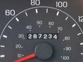 Odometer reading of a 2001 Ford F-350 displaying 287234 miles