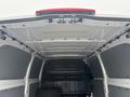 Interior view of a 2021 Mercedes-Benz Metris showcasing the roof and cargo area with grey side panels and a black tire on the floor