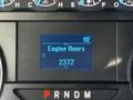 Dashboard display of a 2020 Ford F-550 showing engine hours as 2372 on a digital screen