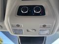Interior climate control panel with knobs for temperature and airflow adjustments along with overhead lights in a 2025 Ford Transit T-350