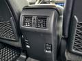 Interior rear ventilation system of a 2018 Toyota 4Runner featuring air vents and control buttons