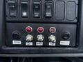 Control panel with switches and buttons labeled for amber light, left light, back light, right light, and beacons