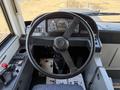Interior view of a 2016 Grande West Vicinity bus focusing on the steering wheel and dashboard controls