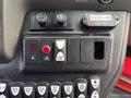 Control panel of a 2021 Ford Transit-350 featuring various buttons for door controls and lights