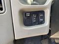 control panel with buttons for mirror adjustment light control and panel settings on a 2014 International TerraStar