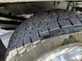 Close-up of a worn tire from a 2020 Ford F-350 SD showing detailed tread patterns and structure