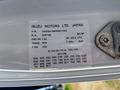 Label on a 2016 Isuzu NPR-HD providing vehicle information such as VIN engine type and options