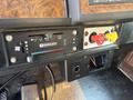 Control panel of a 1996 Kenworth T800 featuring various knobs and switches for ventilation and air supply