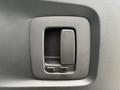 Close-up of a vehicle door handle with a lever and a sliding mechanism designed for a 2020 Mercedes-Benz Sprinter 2500