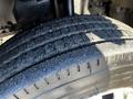 Close-up of a 2014 Mitsubishi Fuso FE tire showing tread pattern and surface details