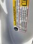 A tire loading information label for a 2023 GMC Savana detailing occupant capacity tire sizes and pressure recommendations