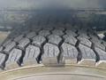 Close-up of a rugged tire from a 2011 Workhorse W62 showing deep tread patterns designed for traction and stability