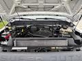 Engine compartment of a 2013 Ford F-250 SD showcasing the engine components and layout