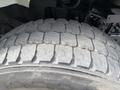 Close-up of a worn tire with distinct tread patterns on a 2014 International 7500 vehicle