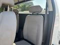 Interior of a 2017 Chevrolet Colorado showing two gray upholstered front seats with headrests
