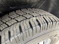 A close-up of a 2020 RAM Promaster tire showing the tread pattern and details of the rubber surface